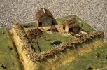 9a. Grâce aux précisions apportées par les archéologues, une maquette du village des Mureaux daté du Haut Moyen Âge (VIIe s. ap. J.-C.) a été réalisée.